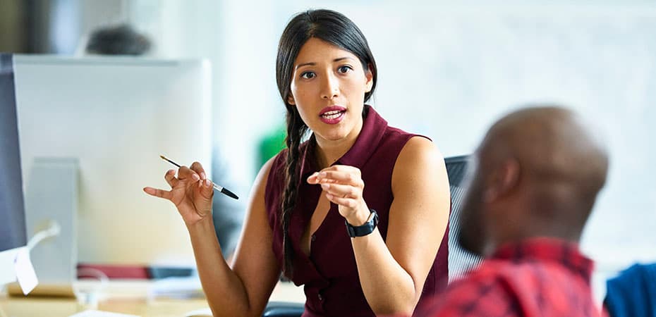 Man and woman talking in modern office