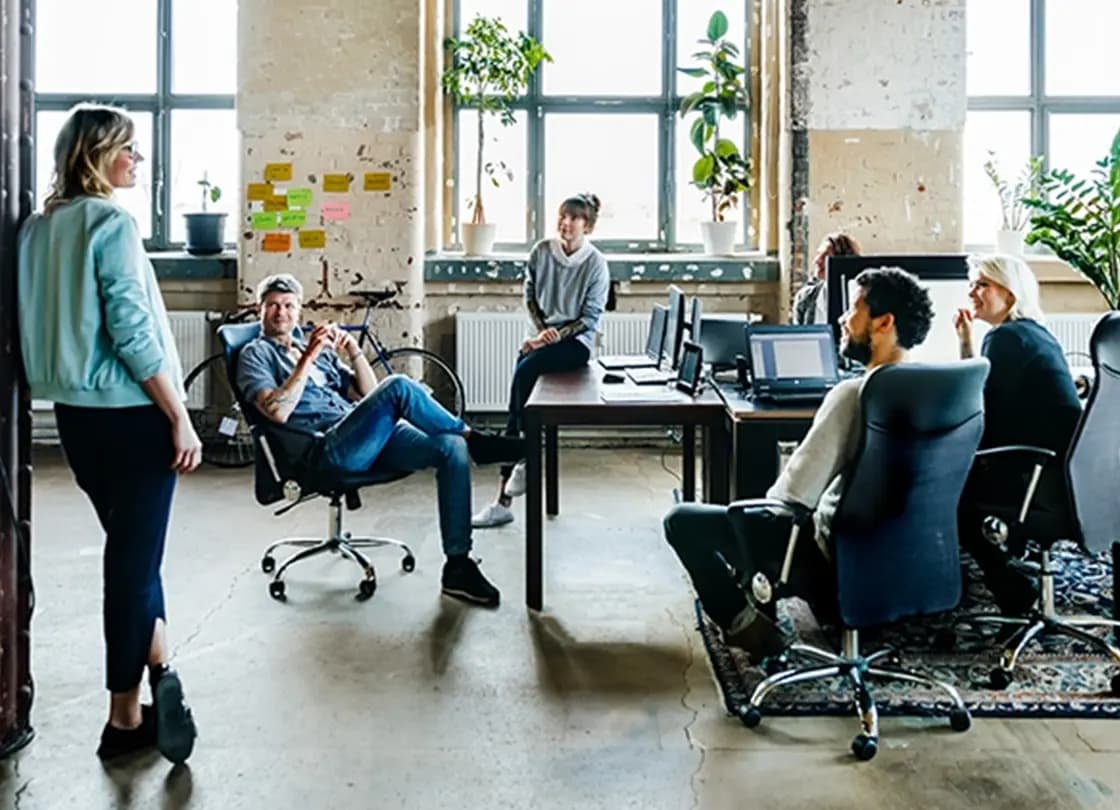 group of colleagues working in office