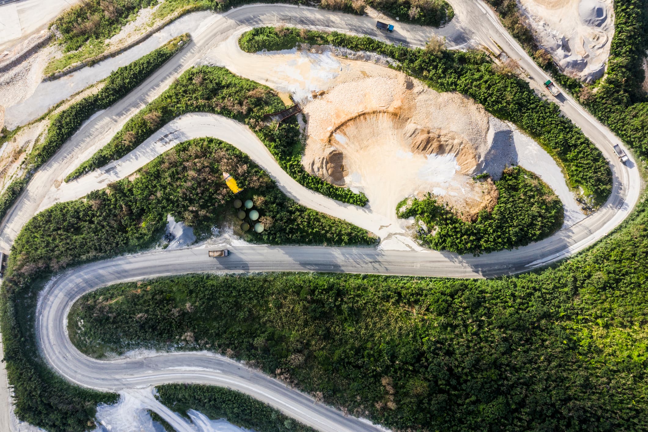 Aerial photograph of forest road and construction site.
